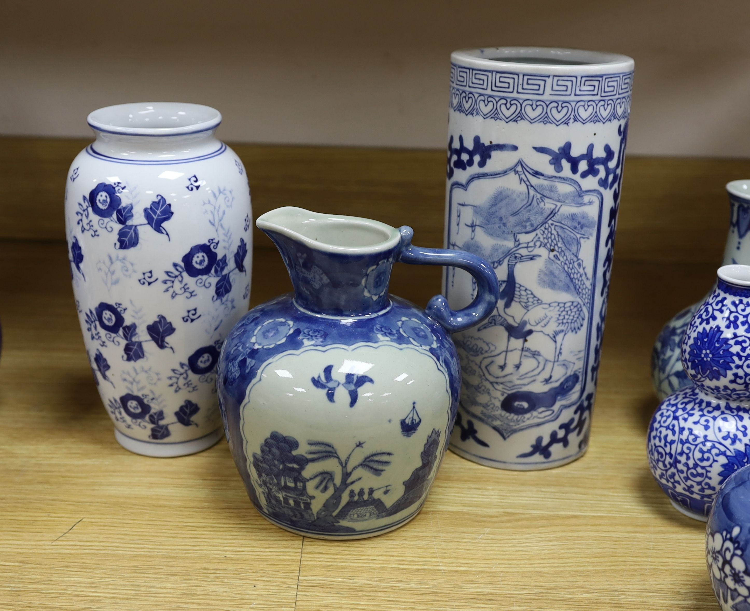 A group of Chinese blue and white porcelain including an early 20th century vase, tallest 28cm